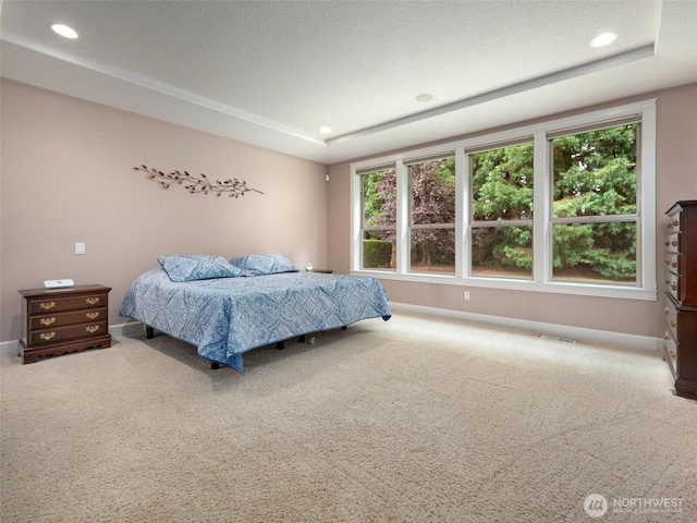 bedroom featuring baseboards and carpet flooring