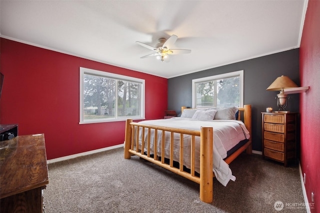 bedroom featuring crown molding, carpet, ceiling fan, and baseboards