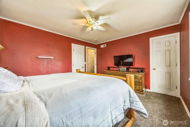 carpeted bedroom featuring crown molding, baseboards, ceiling fan, and visible vents