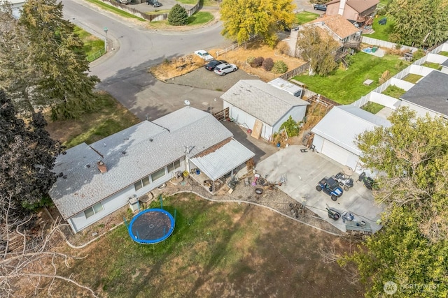birds eye view of property with a residential view