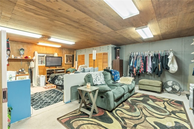 living room with wood walls and wood ceiling