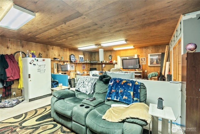living room with wooden walls and wooden ceiling