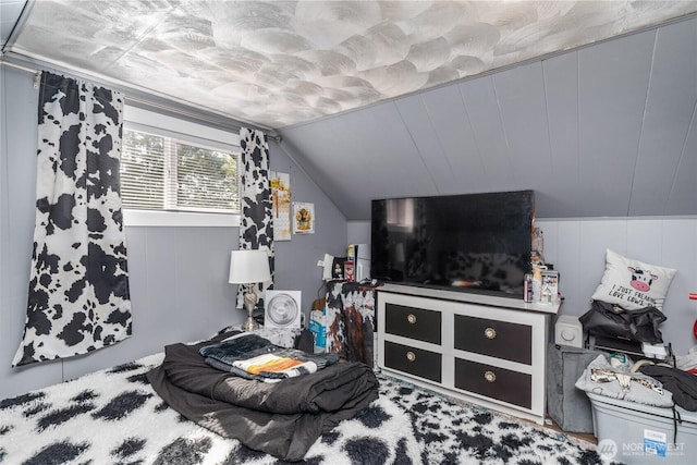 bedroom with vaulted ceiling