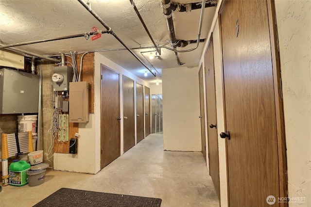 unfinished basement featuring electric panel