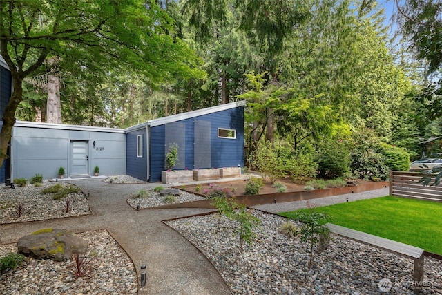exterior space with a yard