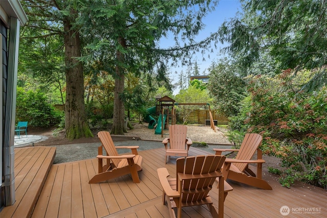 wooden deck with a playground