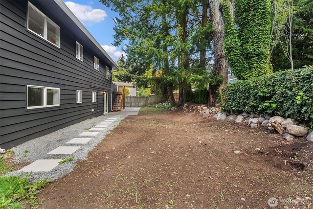 view of yard with fence