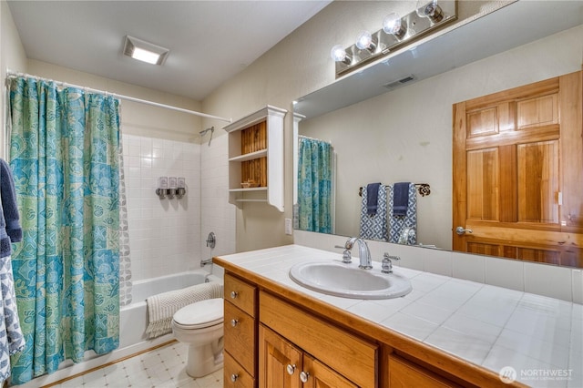 135 NE Boad Haven Rd, Belfair, WA 98528 - bathroom featuring shower / bathtub combination with curtain, toilet, and vanity