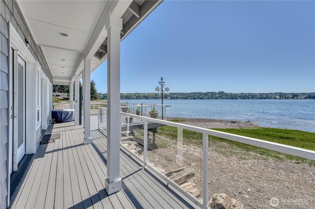 135 NE Boad Haven Rd, Belfair, WA 98528 - wooden terrace with a water view