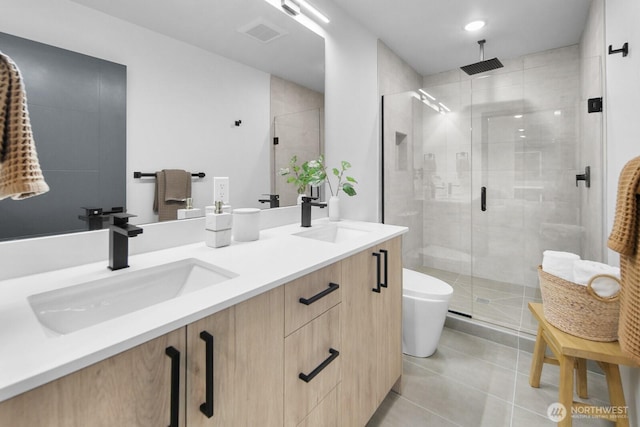822B NW 52nd St, Seattle, WA 98107 - bathroom featuring a sink, tile patterned flooring, a stall shower, and double vanity