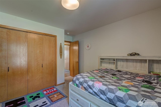 carpeted bedroom with a closet