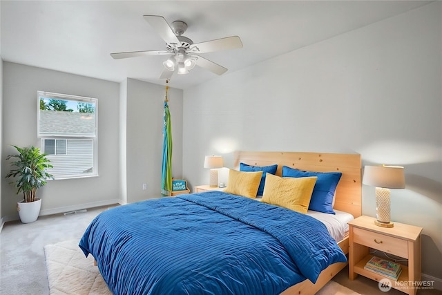 bedroom featuring carpet flooring, baseboards, and ceiling fan