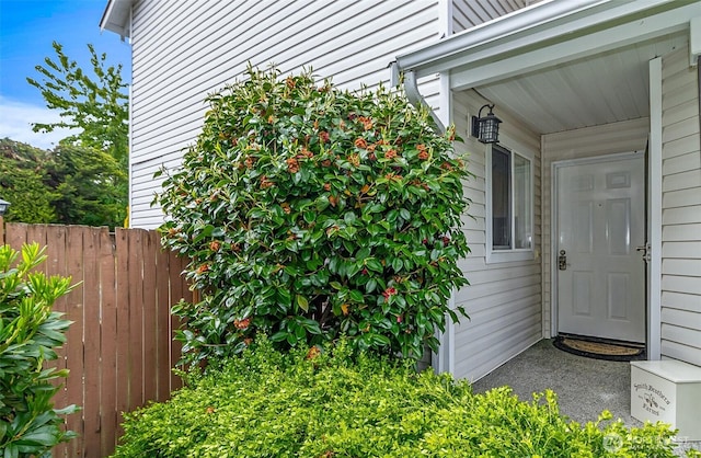 property entrance with fence