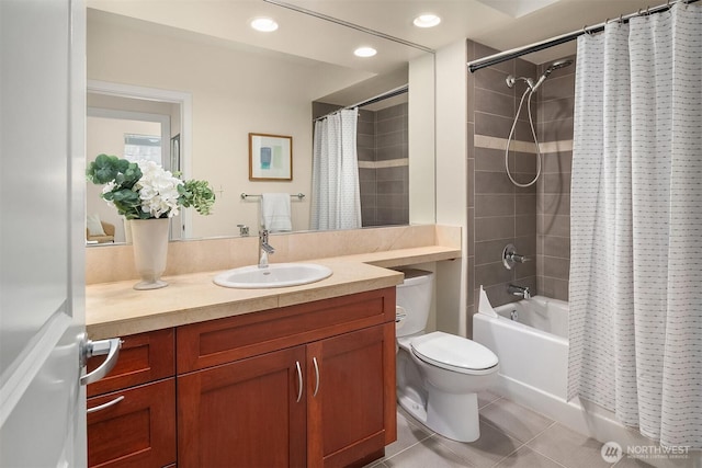 bathroom featuring tile patterned flooring, shower / bath combo, vanity, toilet, and recessed lighting