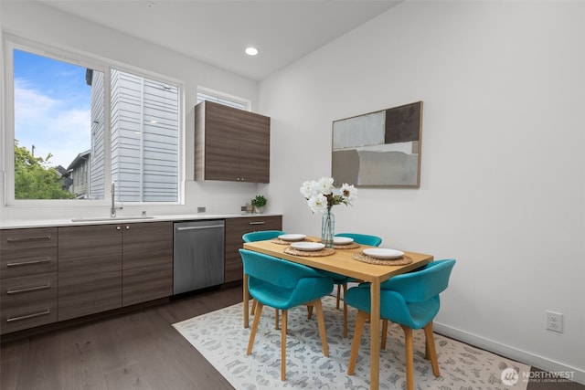 dining area with recessed lighting, baseboards, and dark wood finished floors