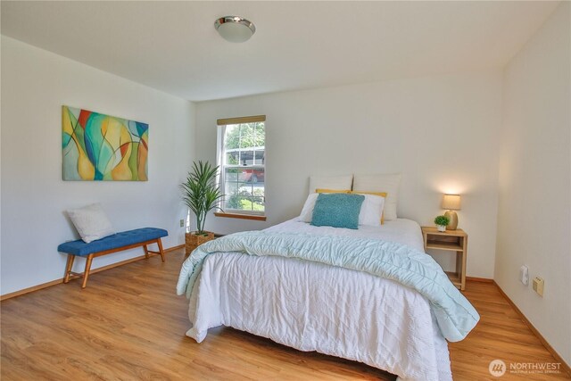500 Creekside Ter Unit 101, Langley, WA 98260 - bedroom featuring wood finished floors and baseboards