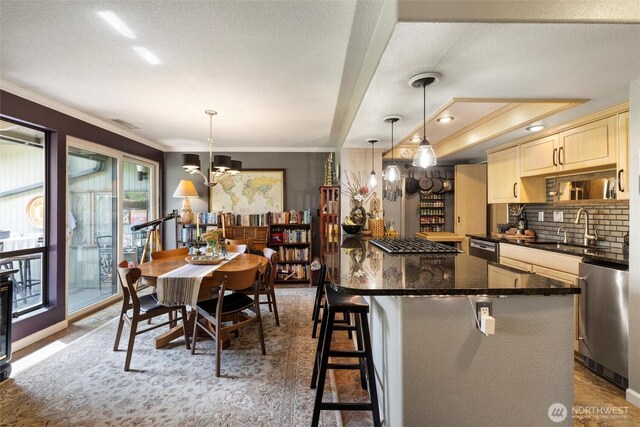 dining area featuring an inviting chandelier, ornamental molding, and a textured ceiling