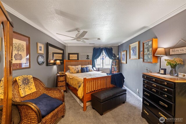 bedroom with crown molding, a textured ceiling, and light colored carpet