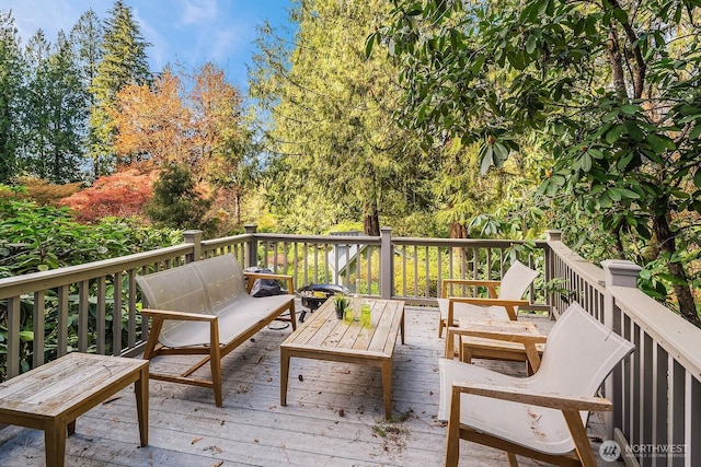 deck featuring an outdoor living space
