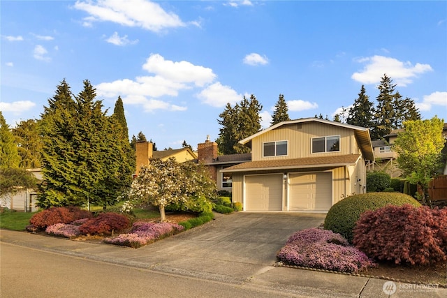 view of front of property with an attached garage and driveway