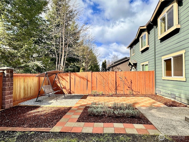 view of yard with a fenced backyard