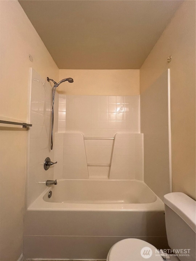 full bathroom featuring bathing tub / shower combination and toilet