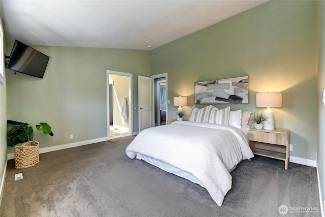 bedroom with baseboards, carpet flooring, and lofted ceiling