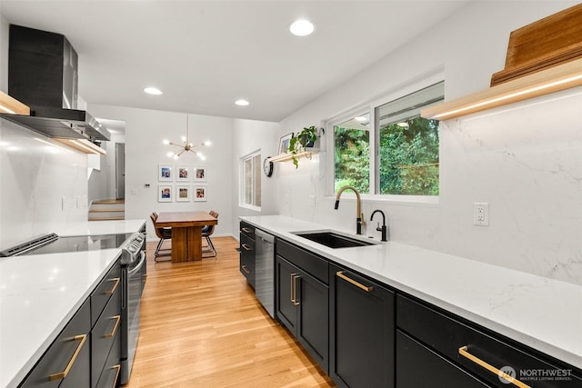 kitchen with open shelves, a sink, dishwasher, light wood-style flooring, and black range with electric cooktop