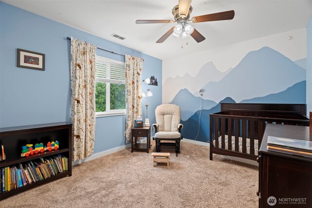 3688 E Indiana St, Port Orchard, WA 98366 - bedroom featuring carpet flooring, baseboards, a nursery area, and a ceiling fan