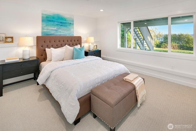 carpeted bedroom with baseboards and recessed lighting