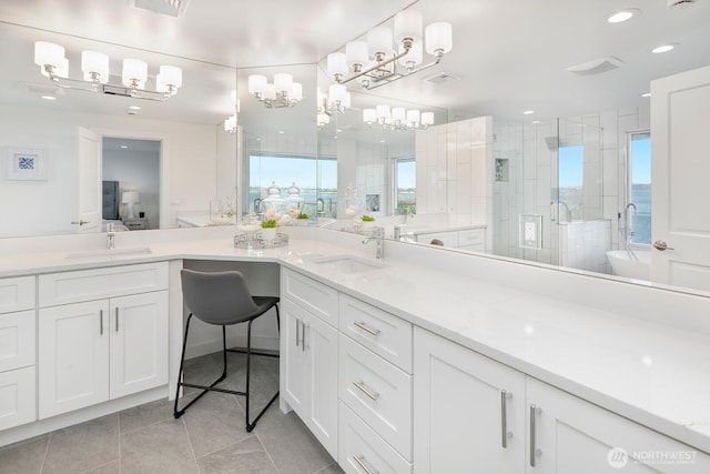 full bath with tile patterned flooring, vanity, visible vents, recessed lighting, and a shower stall
