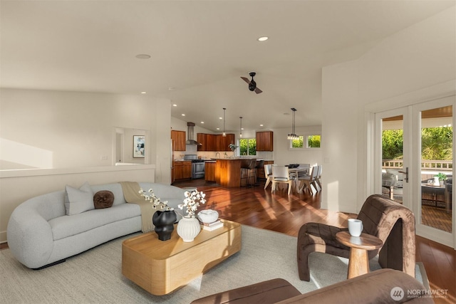 506 13th Ave W, Kirkland, WA 98033 - living room featuring dark wood finished floors, recessed lighting, and vaulted ceiling