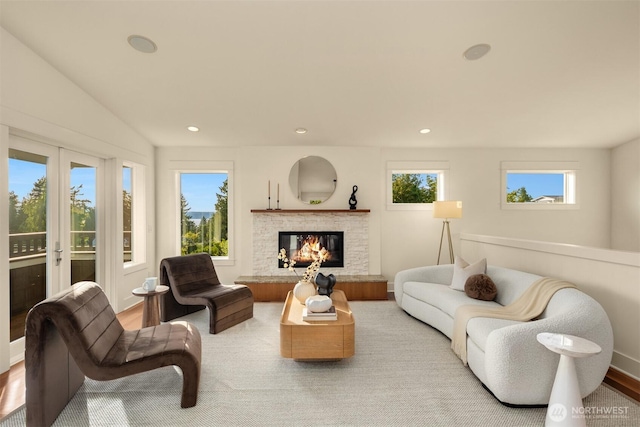 506 13th Ave W, Kirkland, WA 98033 - living room with baseboards, a glass covered fireplace, and recessed lighting