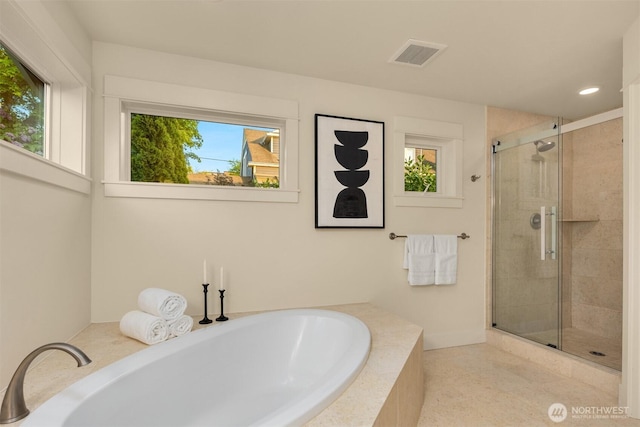 506 13th Ave W, Kirkland, WA 98033 - bathroom featuring a shower stall, a garden tub, recessed lighting, and baseboards