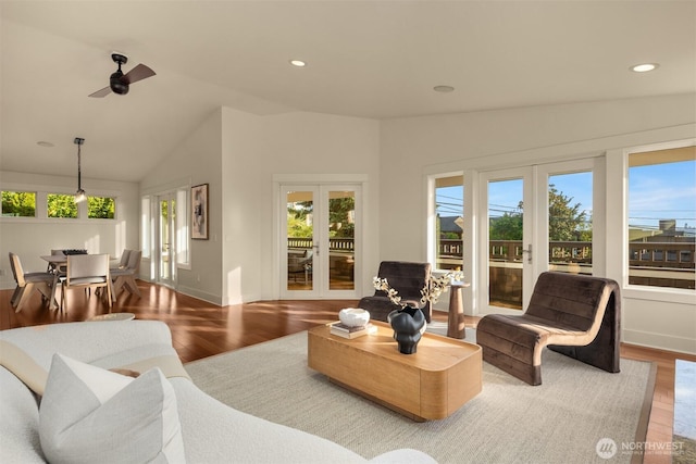 506 13th Ave W, Kirkland, WA 98033 - living room featuring french doors, wood finished floors, baseboards, recessed lighting, and vaulted ceiling