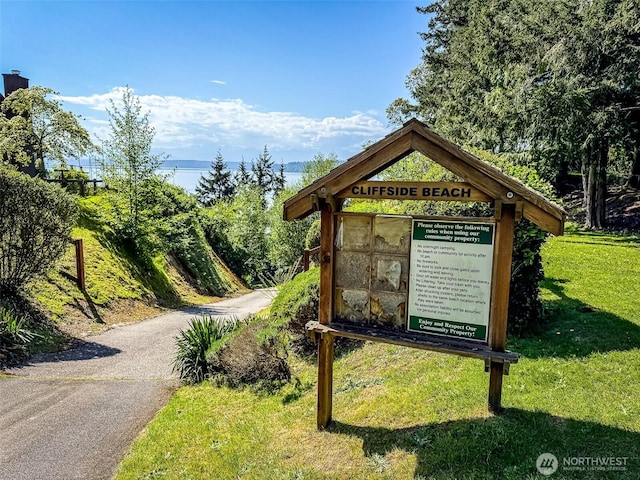 surrounding community with a yard