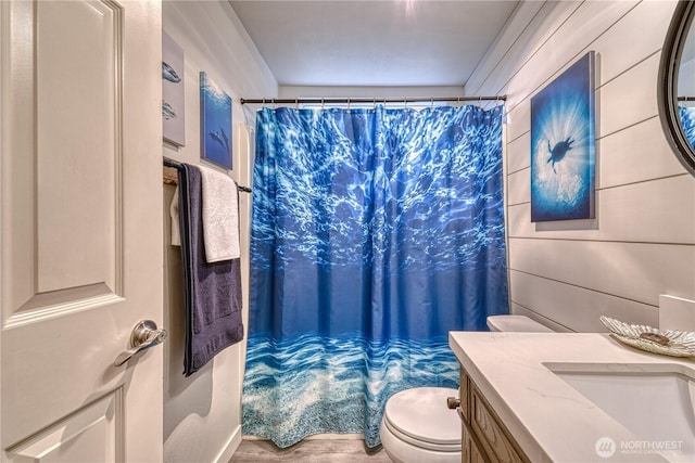 34086 Bridge View Dr NE, Kingston, WA 98346 - full bathroom with toilet, wood finished floors, vanity, and curtained shower