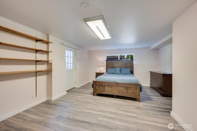 3507 222nd St SW, Mountlake Terrace, WA 98043 - bedroom with multiple windows, wood finished floors, and baseboards