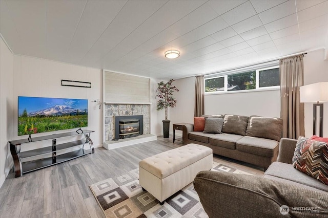 3507 222nd St SW, Mountlake Terrace, WA 98043 - living area with wood finished floors and a stone fireplace