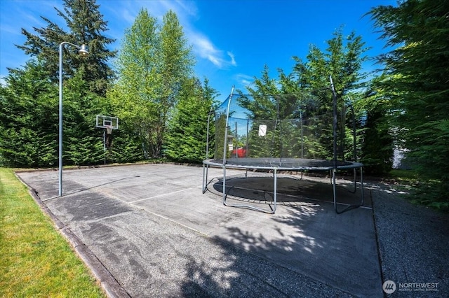 3507 222nd St SW, Mountlake Terrace, WA 98043 - view of patio / terrace featuring a trampoline
