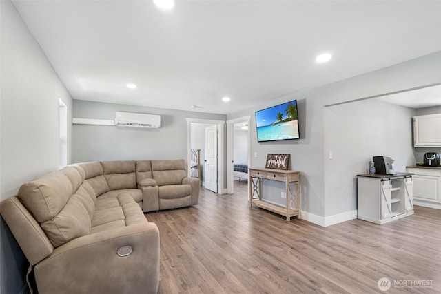 245 Stowell Rd, Salkum, WA 98570 - living area featuring light wood-style floors, baseboards, recessed lighting, and a wall mounted air conditioner