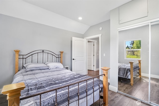 245 Stowell Rd, Salkum, WA 98570 - bedroom with baseboards, wood finished floors, and vaulted ceiling