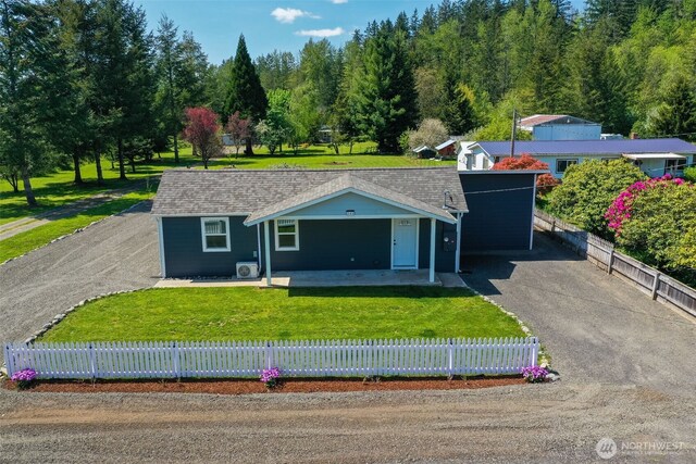 245 Stowell Rd, Salkum, WA 98570 - view of front of house with a fenced front yard, driveway, and a front yard
