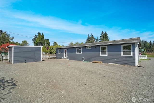 245 Stowell Rd, Salkum, WA 98570 - manufactured / mobile home with a storage shed, fence, and an outdoor structure