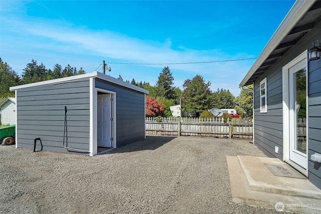 245 Stowell Rd, Salkum, WA 98570 - view of patio featuring an outdoor structure, fence, and a shed