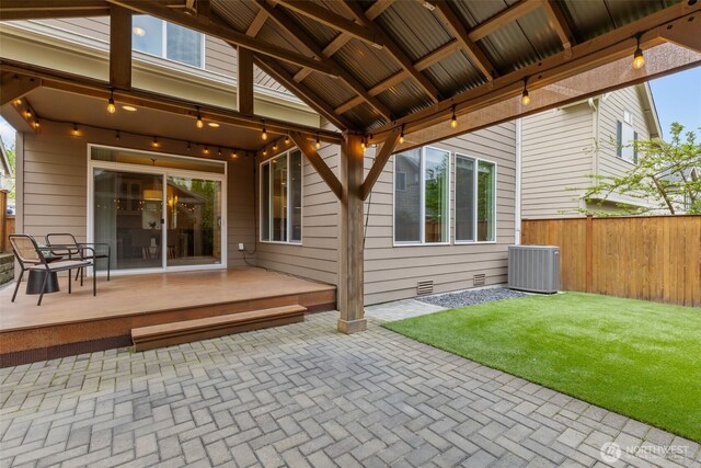 view of patio / terrace with central AC and fence