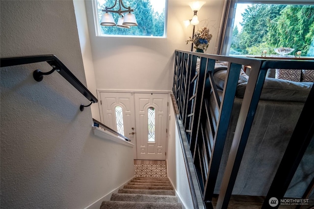 3515 W Tapps Dr E, Lake Tapps, WA 98391 - stairs featuring carpet floors, a textured wall, and plenty of natural light