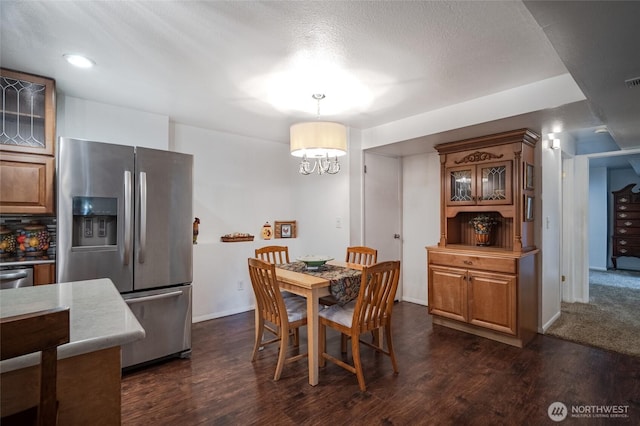 3515 W Tapps Dr E, Lake Tapps, WA 98391 - dining room featuring baseboards, a notable chandelier, and dark wood-style floors