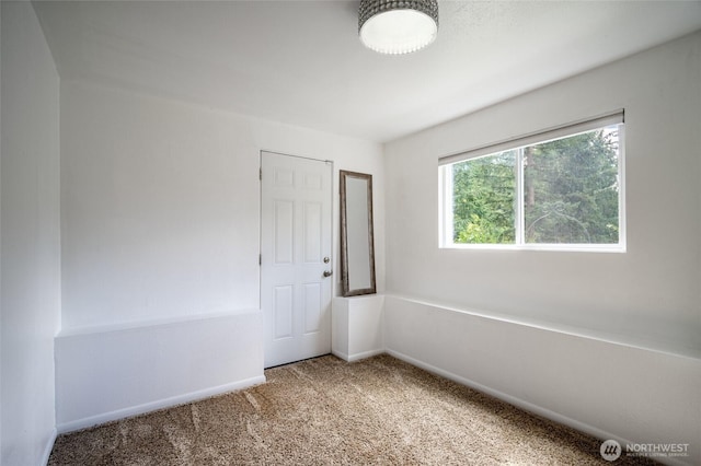 3515 W Tapps Dr E, Lake Tapps, WA 98391 - spare room with baseboards and carpet