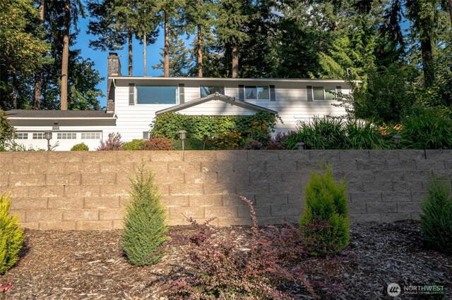 3515 W Tapps Dr E, Lake Tapps, WA 98391 - view of front of home with a chimney